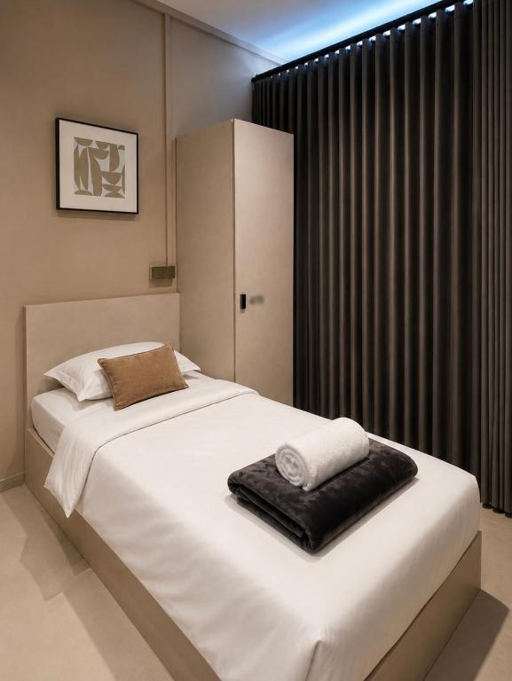 Premium Bed in Male Room at Gather House On 65 South Bridge Road