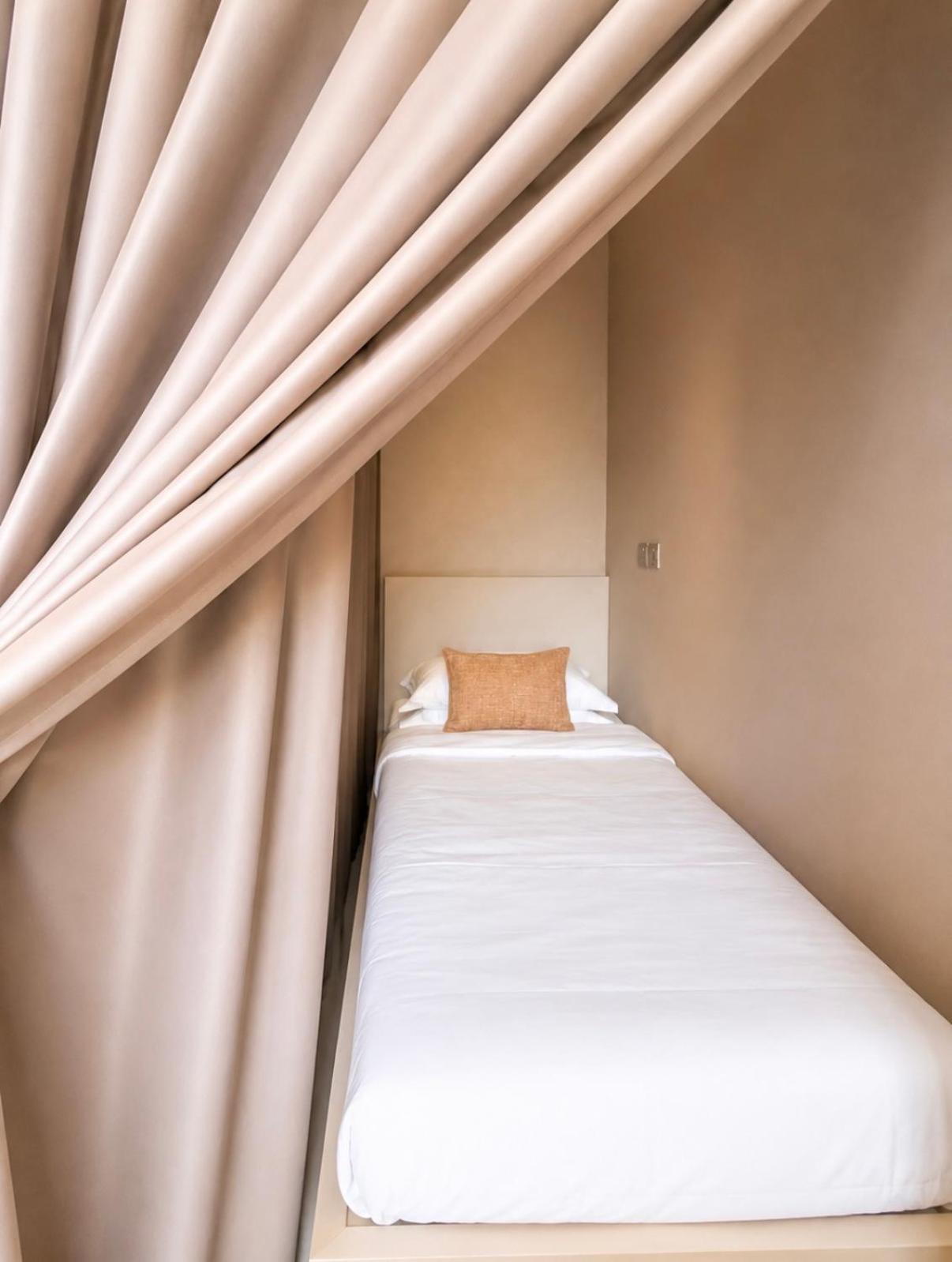Single Bed in Female Dormitory Room at Gather House On 65 South Bridge Road